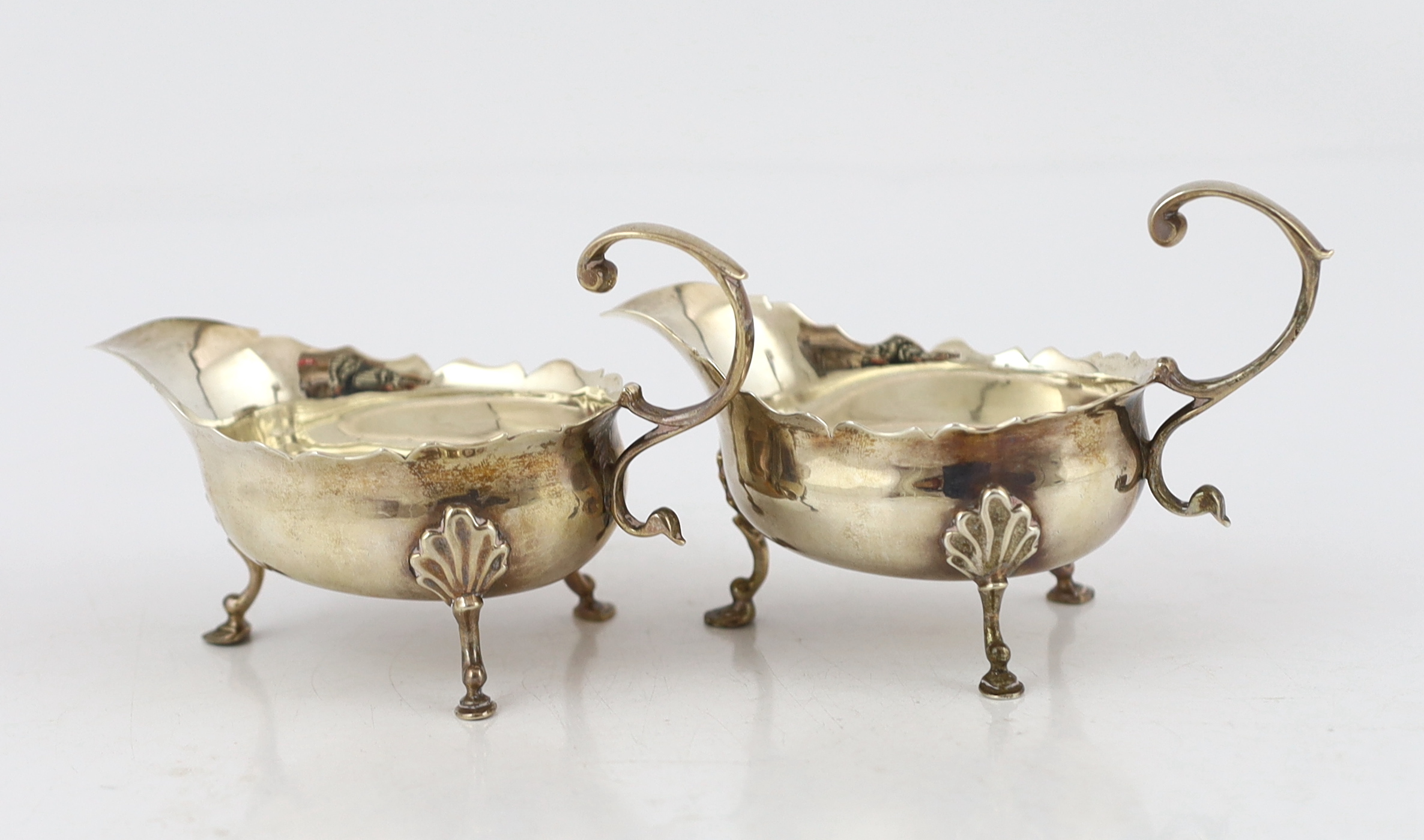 A pair of late George II silver small sauce boats, by Robert Albin Cox